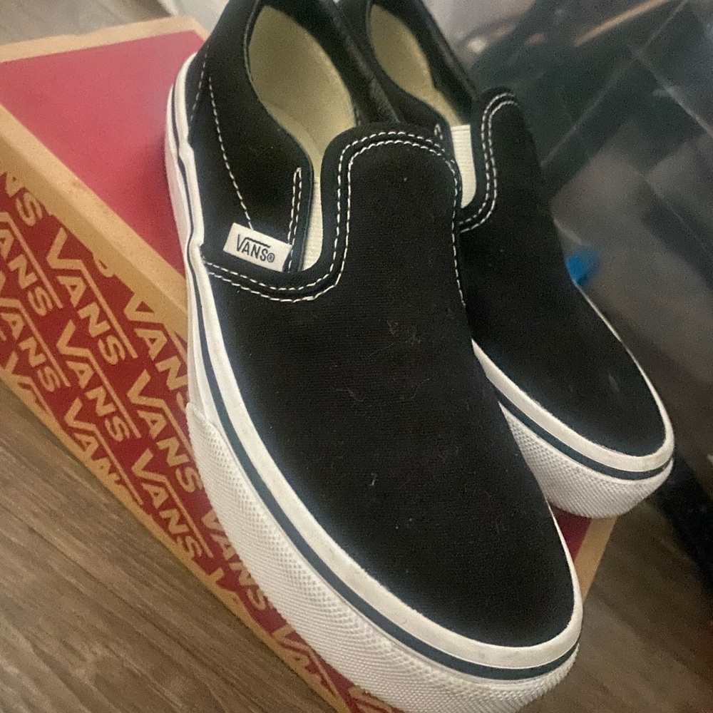 Vans Black Canvas Slip-Ons